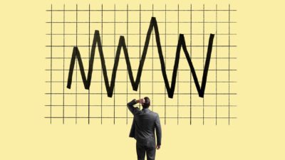 Zig zaggy black line on a yellow graph symbolising volatility.