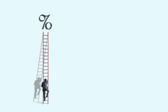 Man climbing ladder to percentage sign, symbolising higher interest rates.