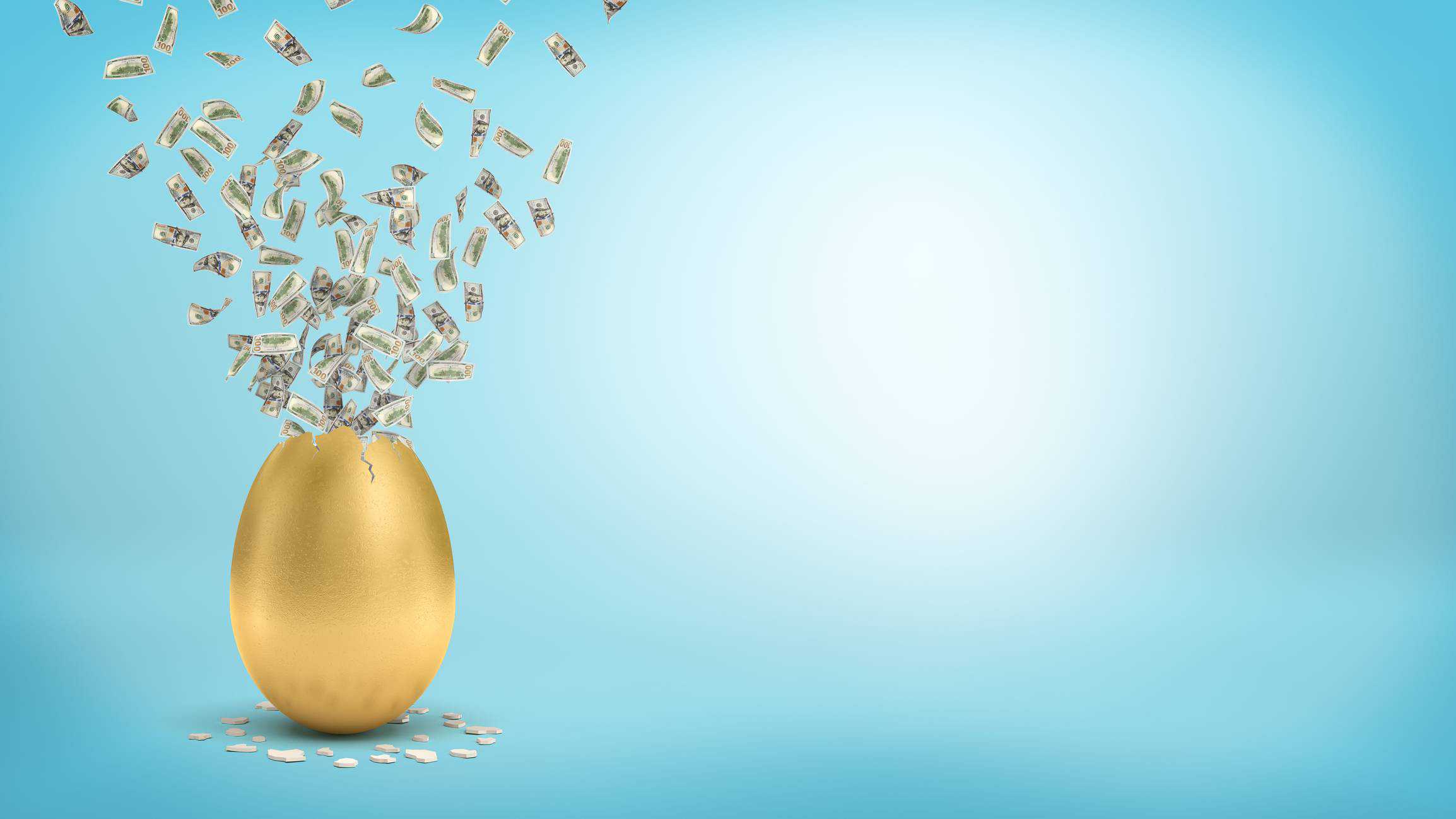 golden egg with dividend cash flying out of it