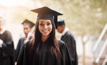 Portrait of a female student on graduation day from university.