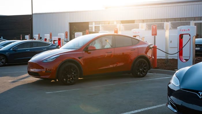 A Tesla electric vehicle beingt charged