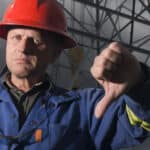 An oil worker giving the thumbs down.