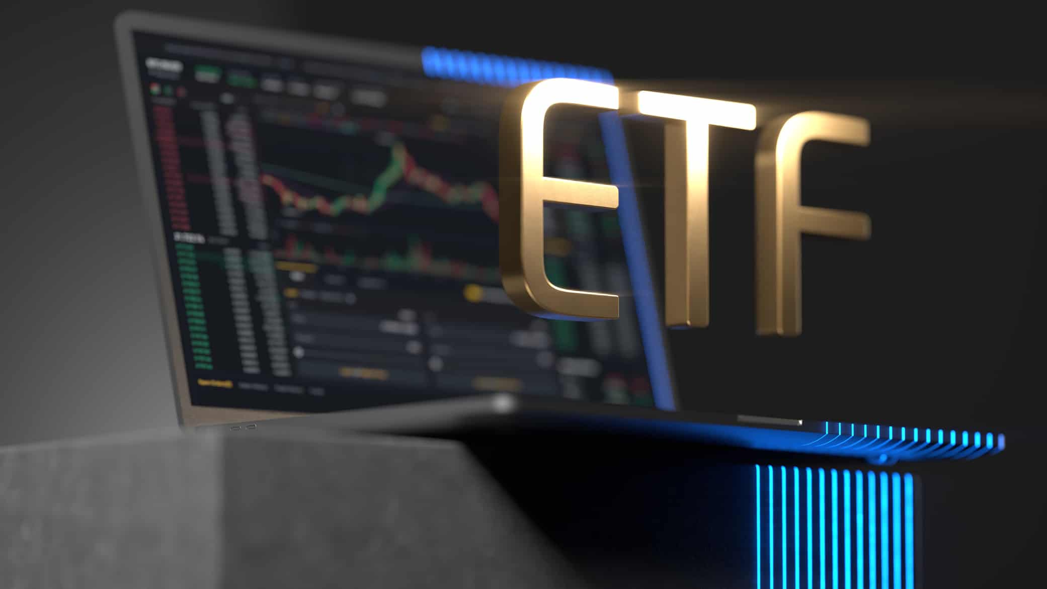 ETF in gold hovering on a laptop.