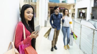 Young people shopping in mall and having fun.