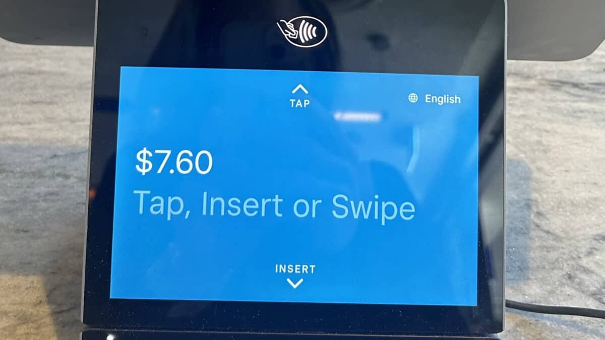 A retail payment terminal displaying the following: $7.60, Tap, Insert or Swipe.
