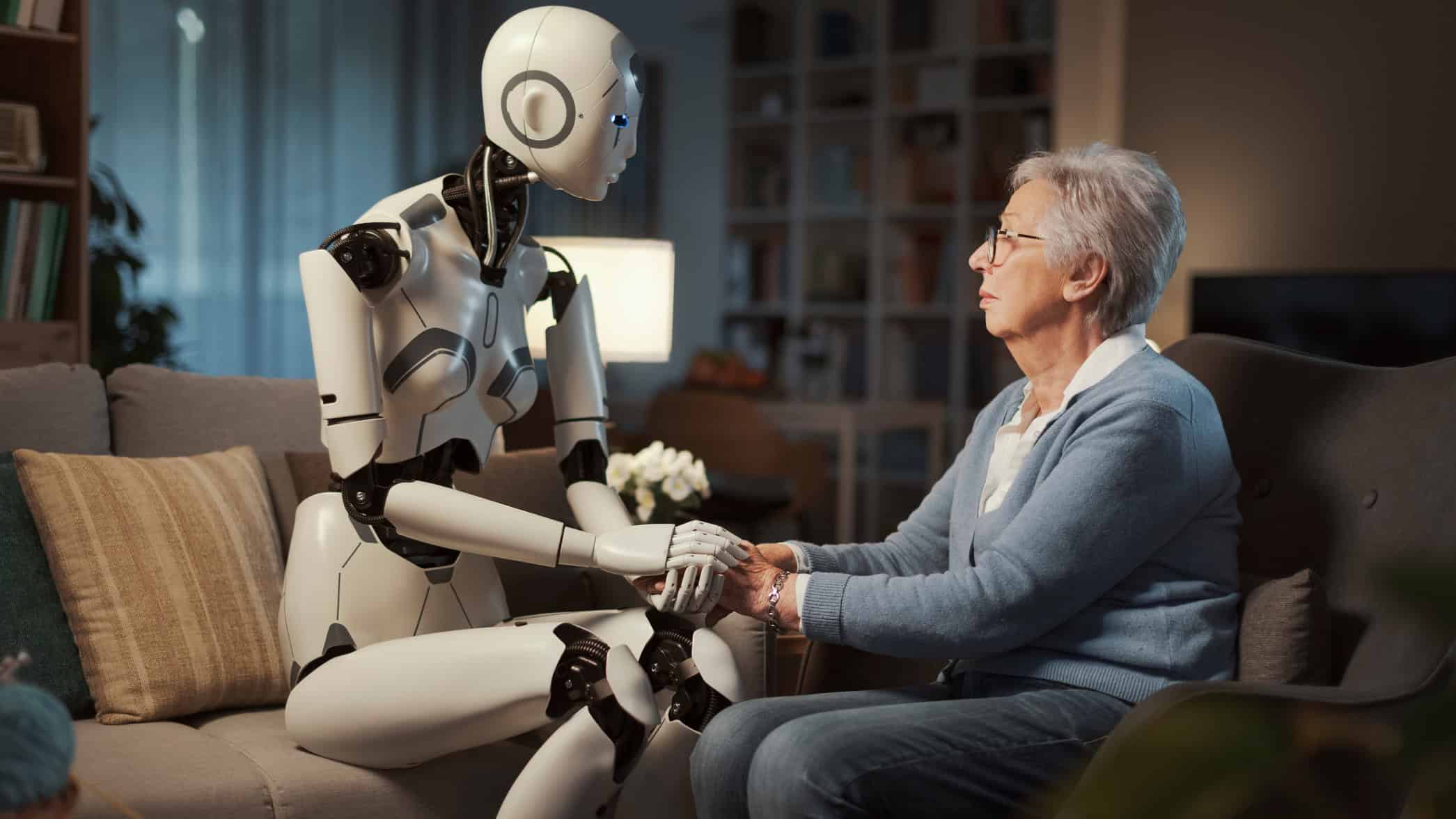 An elderly woman confides her psychological distress to her robotic assistant.