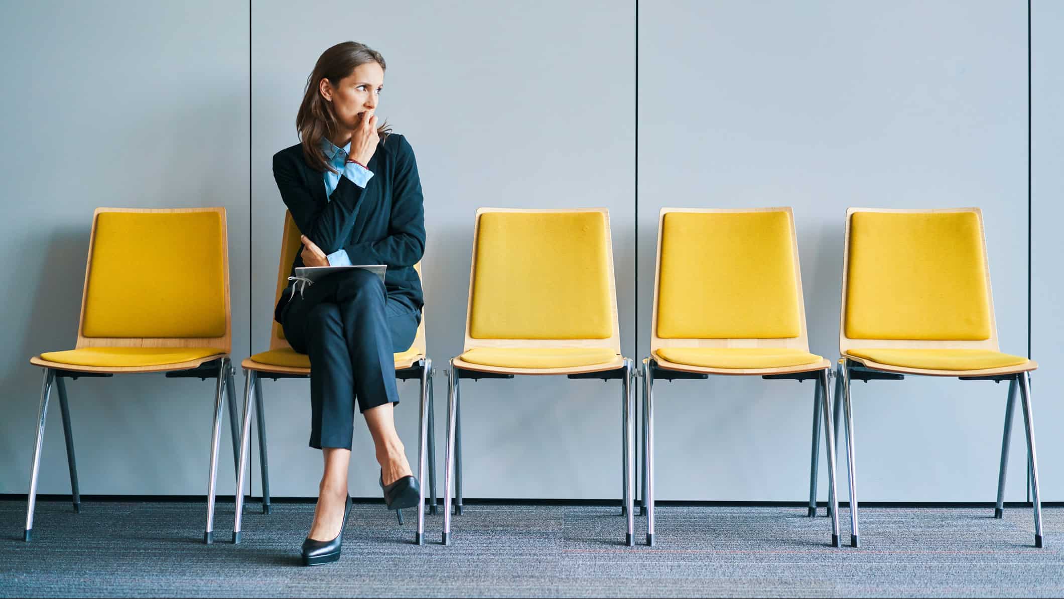 Young woman waiting for job interview.