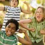 Boys making faces and flexing.