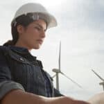 Female engineer at wind farm.