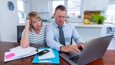 Couple working on their tax returns.