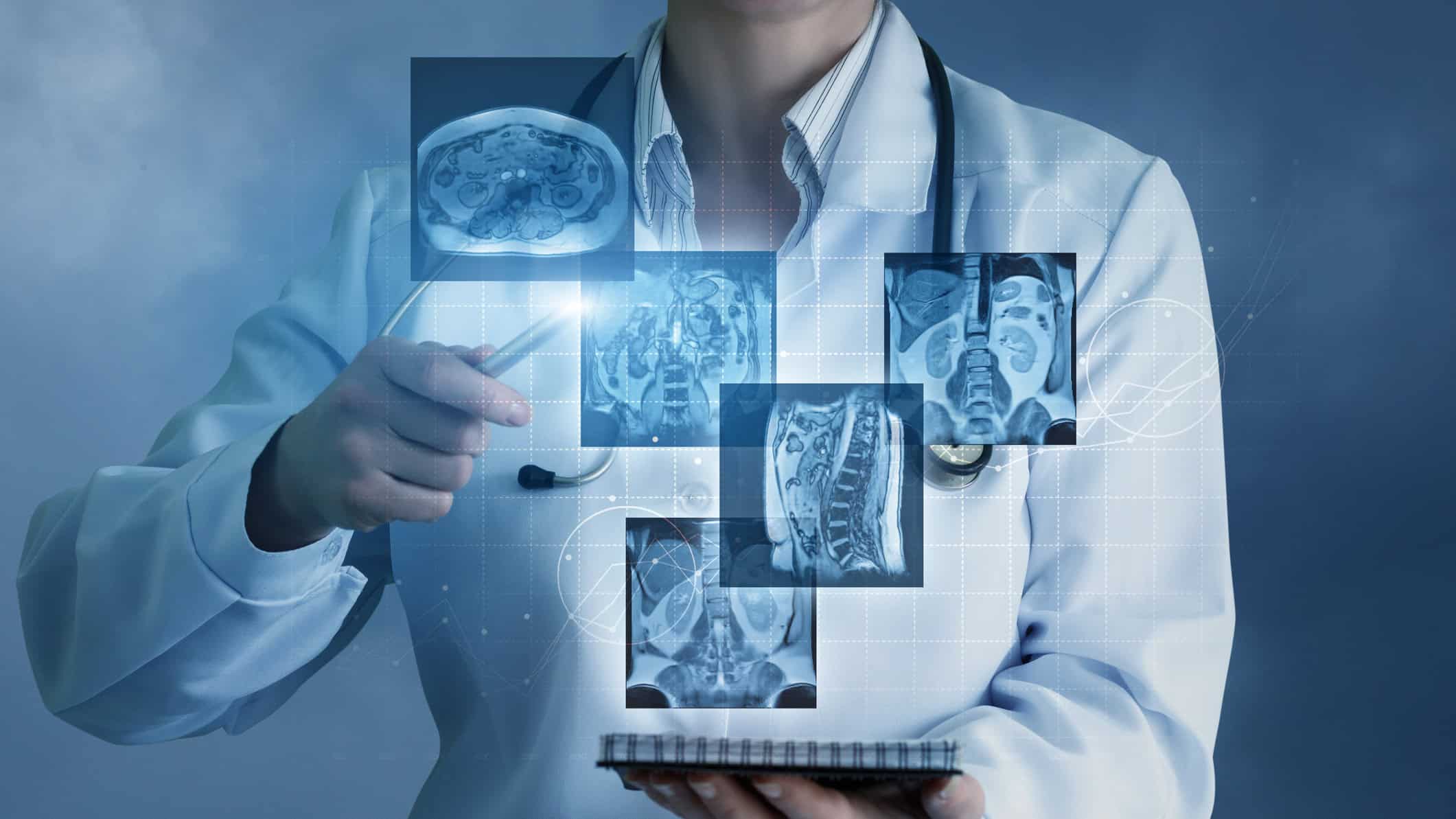 Doctor sees virtual images of the patient's x-rays on a blue background.