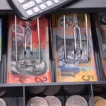 Australian dollar notes and coins in a till.