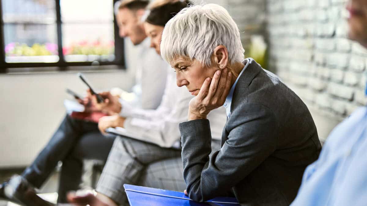 Disappointed woman waiting for an appointment.