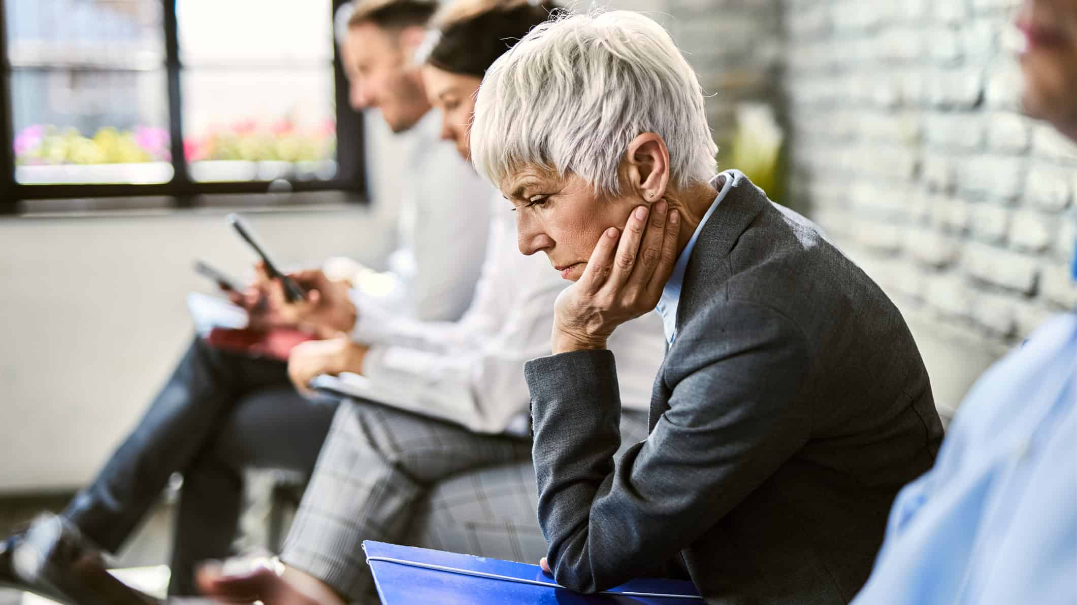 Disappointed woman waiting for an appointment.