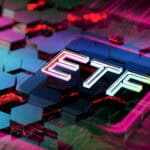 ETF written in white on a multi coloured background.