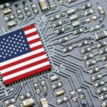 Flag of USA on a processor, CPU Central processing Unit, or GPU microchip on a motherboard.