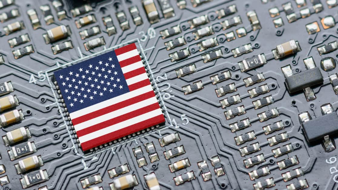 Flag of USA on a processor, CPU Central processing Unit, or GPU microchip on a motherboard.