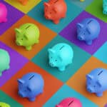 Different coloured piggy banks on different coloured squares.