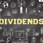 Dividends written in yellow on chalkboard, with finance-related diagrams.