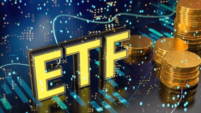 ETF in yellow with chart bars and piles of coins.