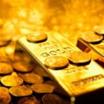 Gold bars on top of coins.