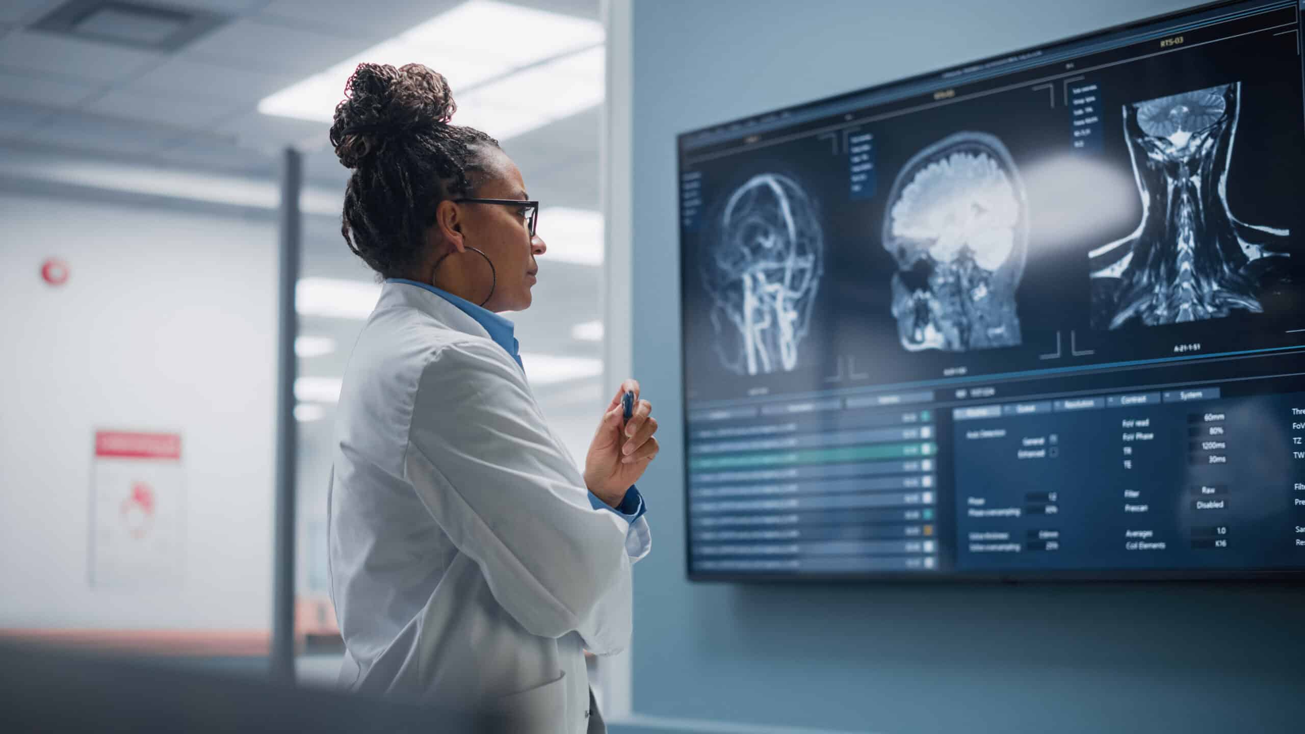 Doctor analysing x-rays.