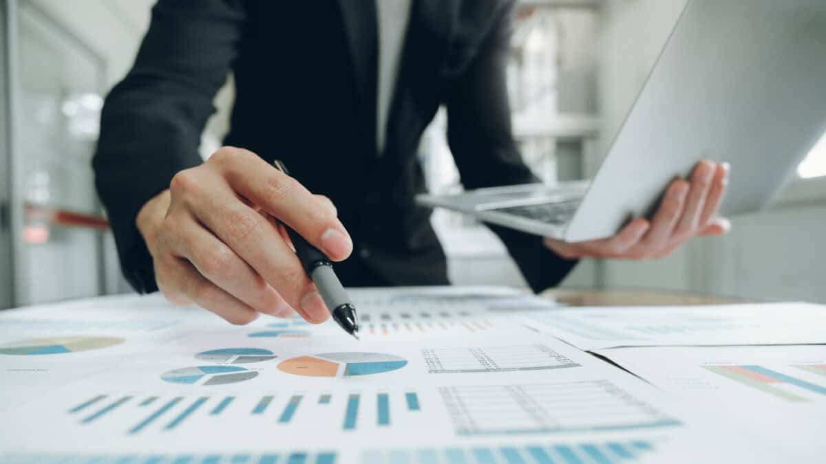 Businessman planning and analysing investment data.